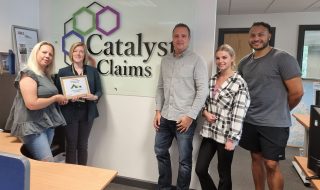 Catalyst team receives charity certificate