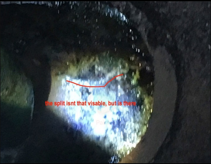 spetic tank claim - split in tank